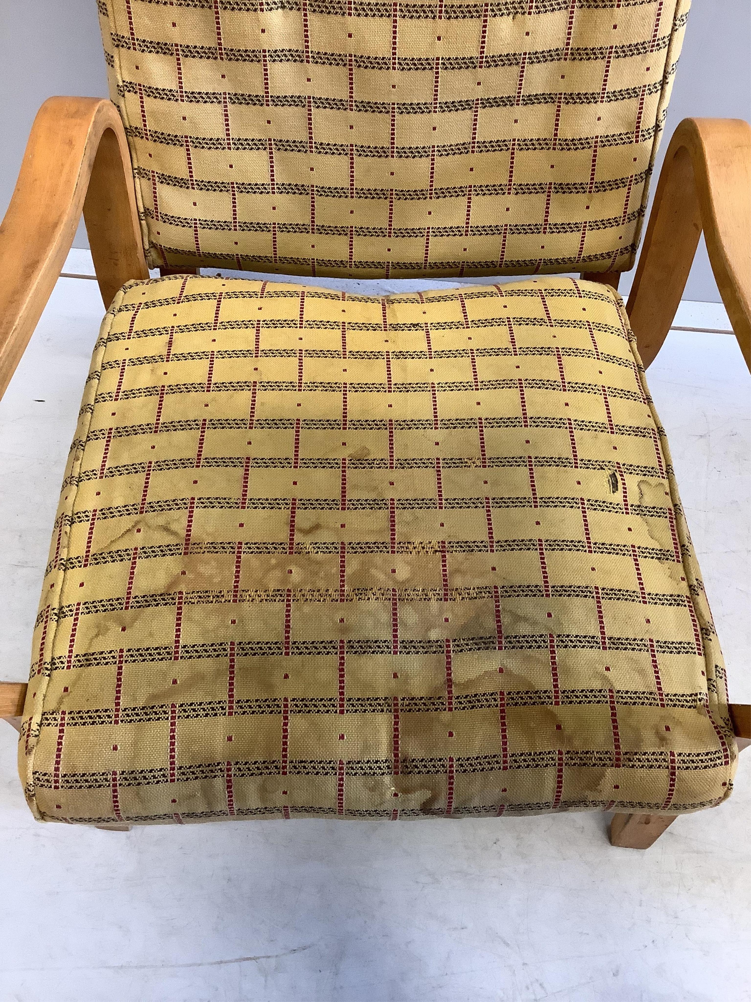 A pair of mid century Eric Lyons Tecta armchairs, width 56cm, depth 54cm, height 85cm. Condition - fair, upholstery poor